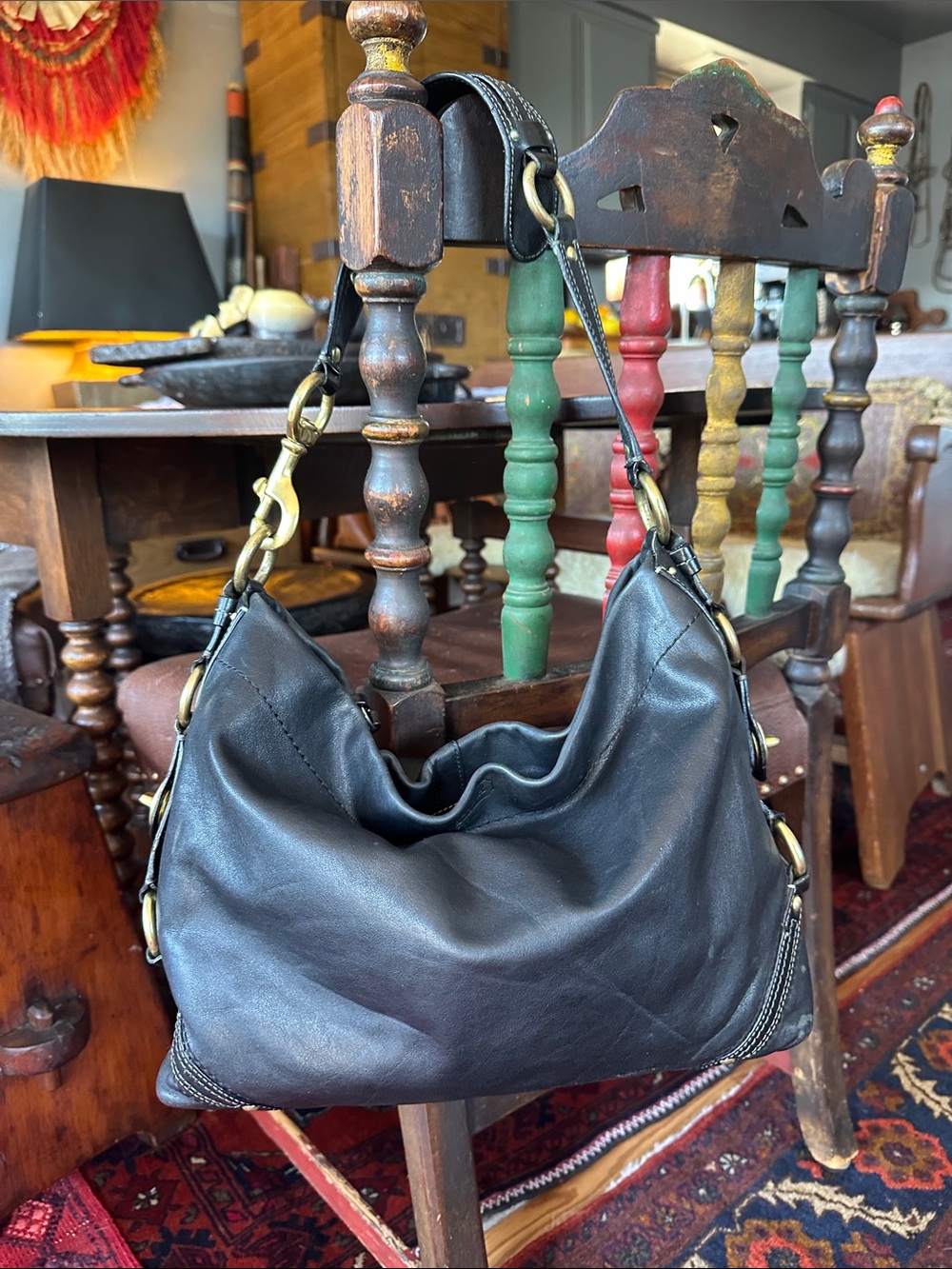 Coach CARLY Black Leather Hobo with lots of cool Brass Hardware. Elegant luxury